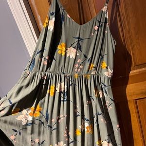 Hi I am selling a old navy army green dress with a floral design